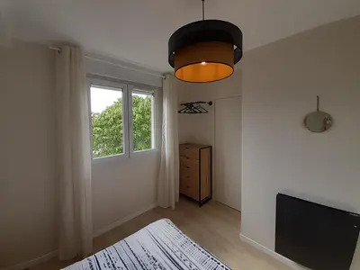 Un ou plusieurs lits dans un hébergement de l'établissement Scandy Appart by Lyonbnb - Eurexpo T2 Tout confort Parking Balcon Vue