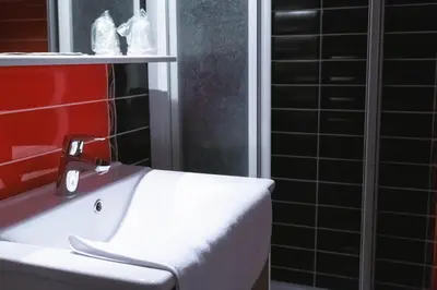 Salle de bains dans l'établissement LA FERME D'ANDRE