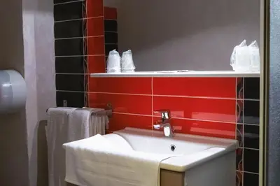 Salle de bains dans l'établissement LA FERME D'ANDRE