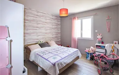 Un ou plusieurs lits dans un hébergement de l'établissement Cozy Home In Pont-Évêque
