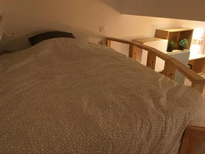 Un ou plusieurs lits dans un hébergement de l'établissement Charmant studio Lyon Terreaux - hyper centre