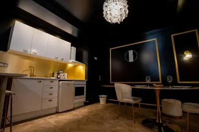 Cuisine ou kitchenette dans l'établissement Appartement d'exception avec Jacuzzi