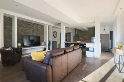 Coin salon dans l'établissement Le Fonctionnel - TravelHome