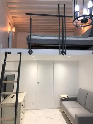Coin salon dans l'établissement L Ancien Canut Cosy