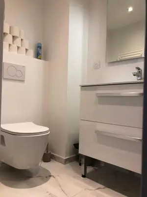 Salle de bains dans l'établissement L Ancien Canut Cosy
