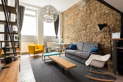 Coin salon dans l'établissement DIFY Le Lodge d Ainay - Proche Bellecour