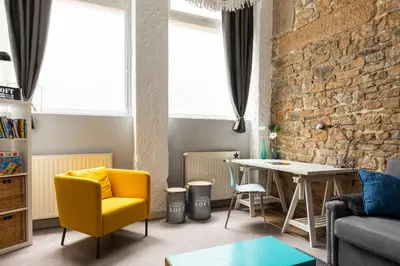 Coin salon dans l'établissement DIFY Le Lodge d Ainay - Proche Bellecour