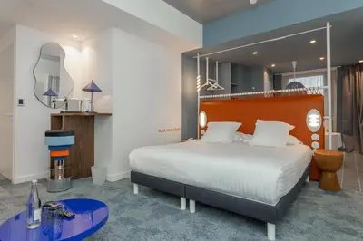 Un ou plusieurs lits dans un hébergement de l'établissement The Ruck Hotel
