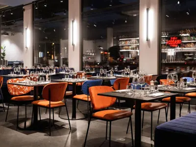 Restaurant ou autre lieu de restauration dans l'établissement The Ruck Hotel