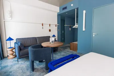 Un ou plusieurs lits dans un hébergement de l'établissement The Ruck Hotel