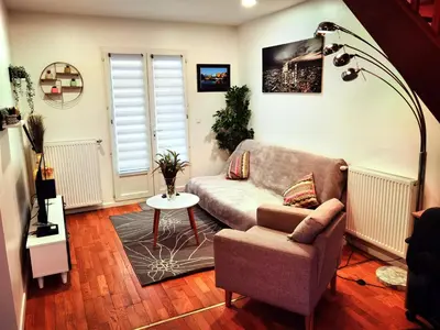 Coin salon dans l'établissement Maisonnette proche de Lyon