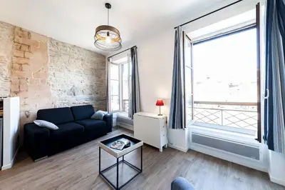 Coin salon dans l'établissement AllinLyon | Charme & vue sur Saône