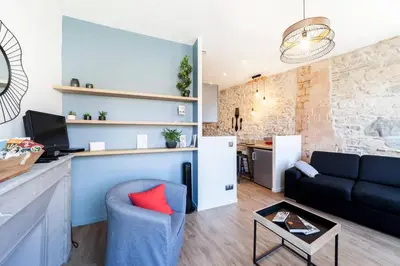 Coin salon dans l'établissement AllinLyon | Charme & vue sur Saône