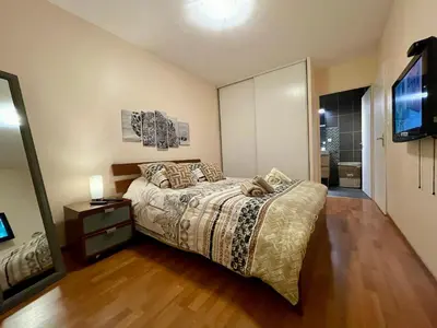 Un ou plusieurs lits dans un hébergement de l'établissement L'idéal Cosy-wifi-Netflix et Garage