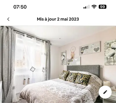 Un ou plusieurs lits dans un hébergement de l'établissement Chambre cosy