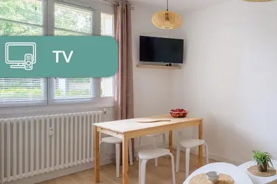 Télévision ou salle de divertissement dans l'établissement Appartement Cosy Lyon Ouest Tassin