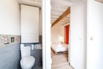 Un ou plusieurs lits dans un hébergement de l'établissement AllinLyon | Duplex vue St-Nizier