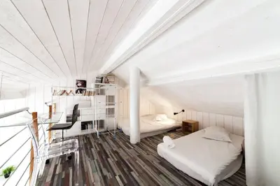 Un ou plusieurs lits dans un hébergement de l'établissement AllinLyon | Duplex vue St-Nizier
