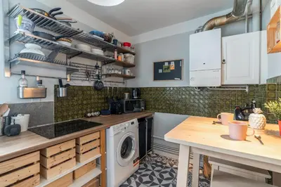 Cuisine ou kitchenette dans l'établissement Appartement de la Bannière - Welkeys