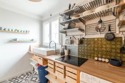 Cuisine ou kitchenette dans l'établissement Appartement de la Bannière - Welkeys
