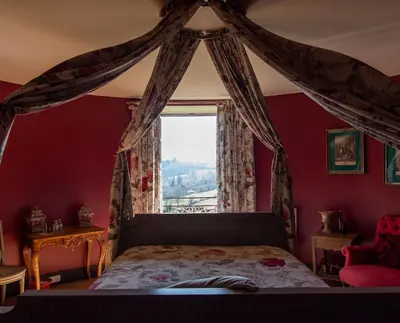 Un ou plusieurs lits dans un hébergement de l'établissement Château de Pramenoux