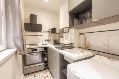 Cuisine ou kitchenette dans l'établissement Le Raffiné avec Caractère en hypercentre
