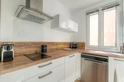 Cuisine ou kitchenette dans l'établissement Le spacieux idéal séjour pro ou week-end famille