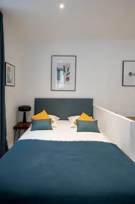 Un ou plusieurs lits dans un hébergement de l'établissement Opéra 8 - Superbe studio refait à neuf proche place des Terreaux