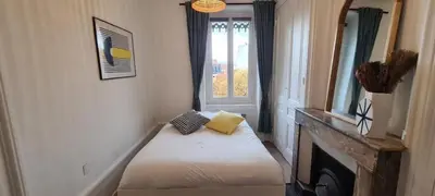 Un ou plusieurs lits dans un hébergement de l'établissement Appartement deux chambres - Garibaldi