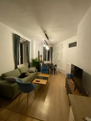 Coin salon dans l'établissement Appartement deux chambres - Garibaldi