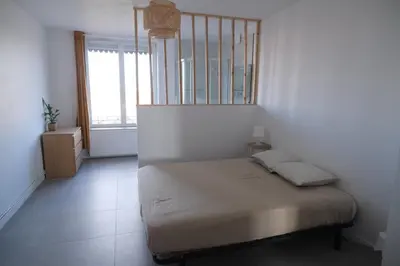 Un ou plusieurs lits dans un hébergement de l'établissement Grand appartement 80m² - Suite parentale