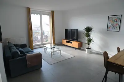 Télévision ou salle de divertissement dans l'établissement Grand appartement 80m² - Suite parentale