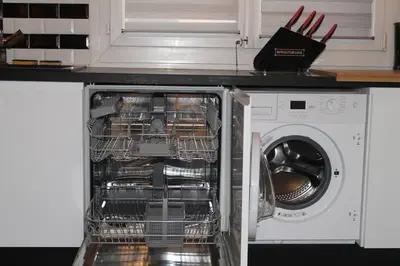 Cuisine ou kitchenette dans l'établissement Appart Crystal Lyon Caluire et parkings