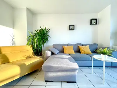 Coin salon dans l'établissement BnGo I Immense RoofTop Lyon I 2 chambres, 4 places parkings, 2 immenses terrasses, 8 personnes