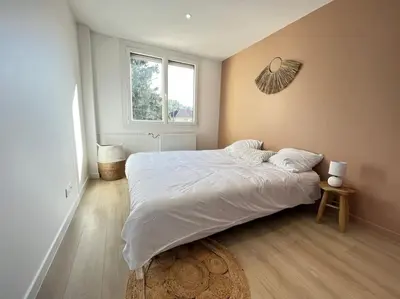 Un ou plusieurs lits dans un hébergement de l'établissement Le Chantereine appartement résidentiel