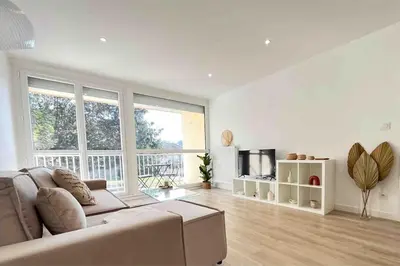 Coin salon dans l'établissement Le Chantereine appartement résidentiel