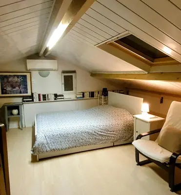 Un ou plusieurs lits dans un hébergement de l'établissement Chambres privées dans maison avec jardin-Proche LDLC-Groupama Stadium-Eurexpo