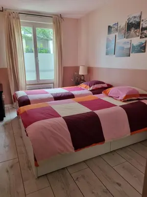 Un ou plusieurs lits dans un hébergement de l'établissement Lyon 8 Grange Blanche Appartement calme de 50 m²