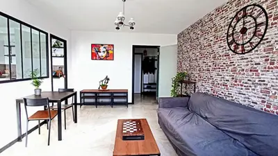 Coin salon dans l'établissement Logement entier proche de Lyon
