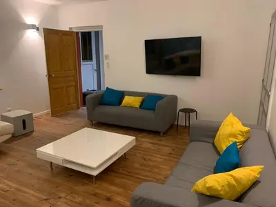 Coin salon dans l'établissement Gîte chez GAREL 15 personnes avec spa