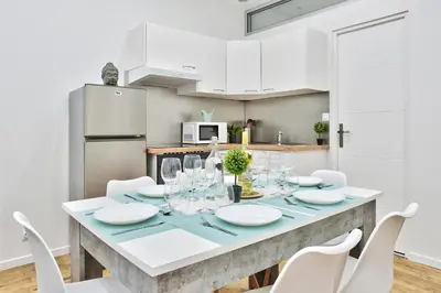 Cuisine ou kitchenette dans l'établissement Appartement Le Cocon Lyonnais