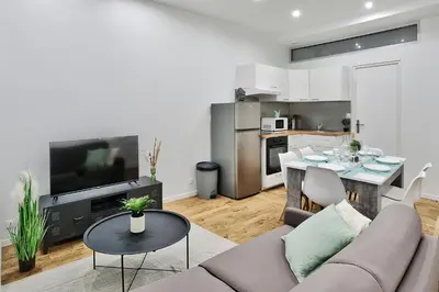 Cuisine ou kitchenette dans l'établissement Appartement Le Cocon Lyonnais