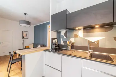 Cuisine ou kitchenette dans l'établissement Appartement Anatha - Welkeys