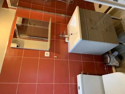 Cuisine ou kitchenette dans l'établissement chambre indépendante chez particuliers avec salle de bain privative