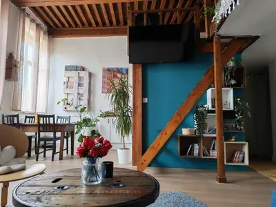 Coin salon dans l'établissement Lyon:superbe canut duplex périmètre Unesco