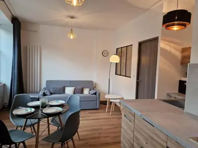 Coin salon dans l'établissement l'Appart des Pierres Dorées
