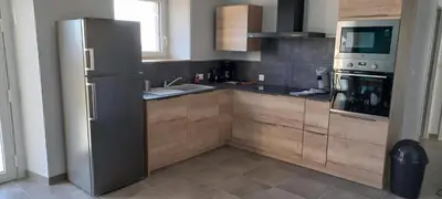 Cuisine ou kitchenette dans l'établissement La Grange de Léobin