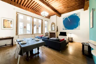 Coin salon dans l'établissement All in Lyon | Grand duplex avec vue sur Fourvière