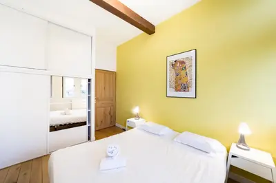 Un ou plusieurs lits dans un hébergement de l'établissement All in Lyon | Grand duplex avec vue sur Fourvière