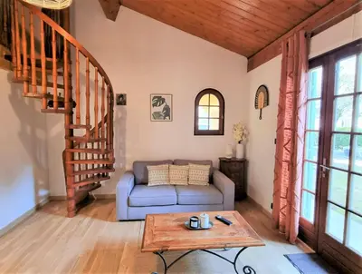 Coin salon dans l'établissement Le Chalet